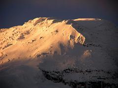 
Here’s a close up of glaciers and the Whymper (6310m, Main) summit of Chimborazo at sunset viewed from the Estrella del Chimborazo.
